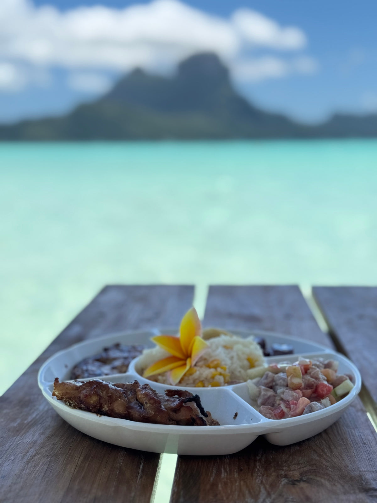 Delicious Polynesian-style buffet featuring local specialties, such as raw fish in coconut milk, grilled fish and BBQ chicken.